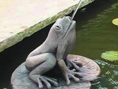 frog garden statue that works as a water feature